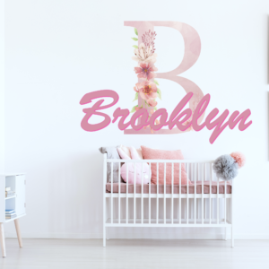 Custom floral monogram wall decal with personalized name Brooklyn in pink baby nursery